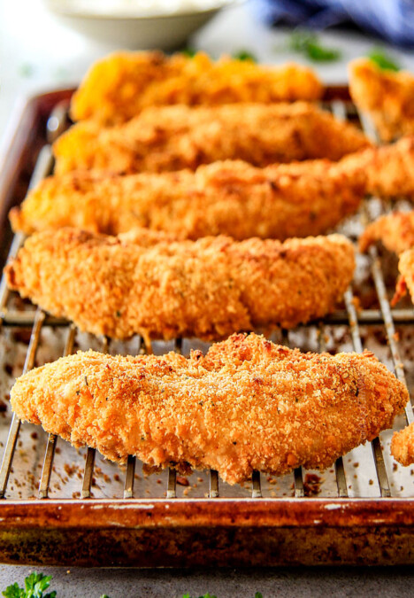 incredibly tender, juicy flavorful Baked Cheddar Ranch Chicken Tenders coated in the most AMAZING cheese cracker breading!  These are pure addicting and SO EASY! 