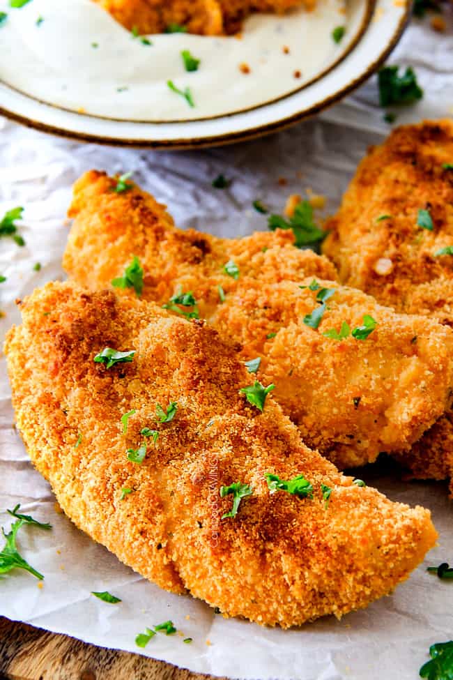 Baked Cheddar Ranch Chicken Tenders with garnish.