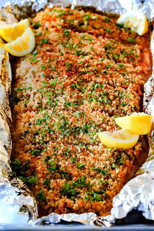 front view of oven baked salmon garnished with parsley