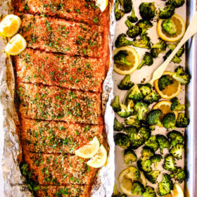 25 MINUTE Baked Lemon Garlic Butter Salmon with Crispy Parmesan Panko & Broccoli!  This salmon is not only bursting with flavor and sooo tender but the easiest, most satisfying meal that tastes totally gourmet!  My parents were blown away by this meal!