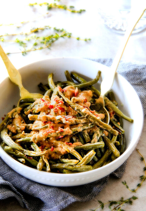 Forget green bean casserole, these wonderfully flavorful, crisp tender Roasted Green Beans with Creamy Gruyere Sauce are AMAZING!!!  They the best green beans you will ever eat!   They are easy enough for every day but delicious enough for special occasions (like Thanksgiving, Christmas!)! 