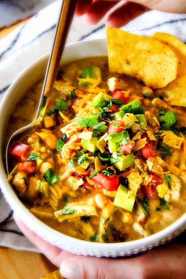 This is the best Slow Cooker Creamy White Chicken Chili I have ever had! Its soooo creamy without heavy cream, so easy, and the layers of flavors are out of this world!