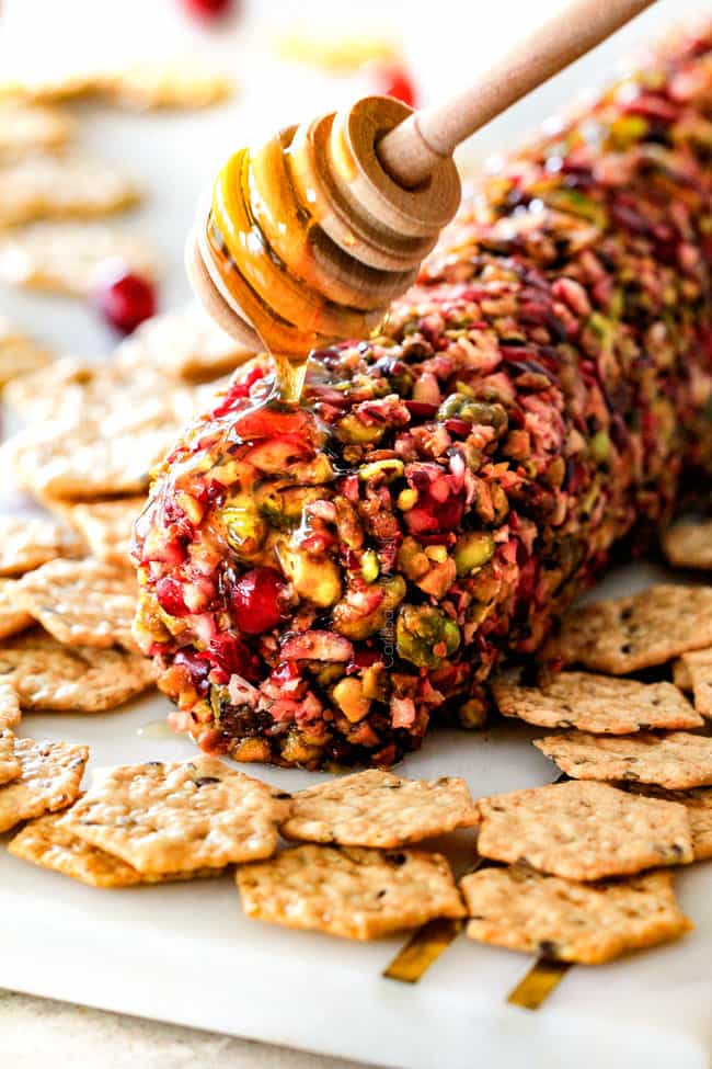 10 Minute prep creamy, sweet and tangy Cranberry Pistachio Cheese Log is the EASIEST yet most impressive appetizer you will ever make! And it can be made DAYS in advance so it’s the perfect appetizer for Thanksgiving, Christmas or any holiday party!