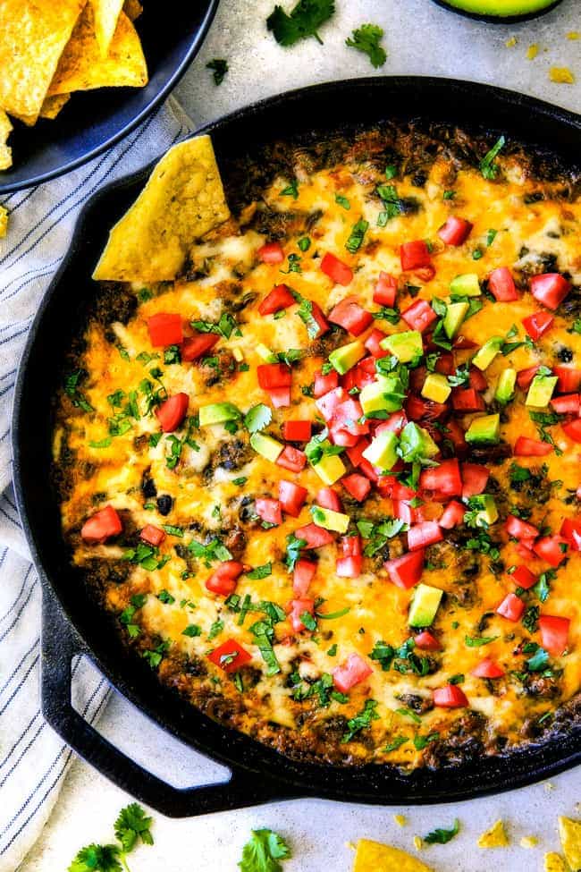 Cheesy Mexican Spinach Dip in cast iron skillet. 