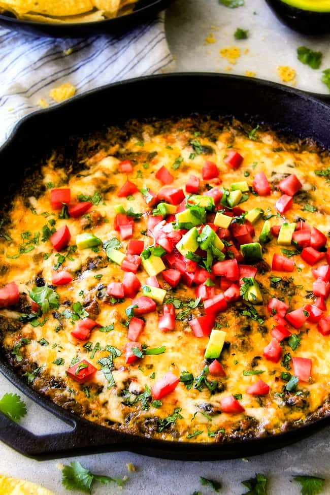 Cheesy Mexican Spinach Dip with avocado.
