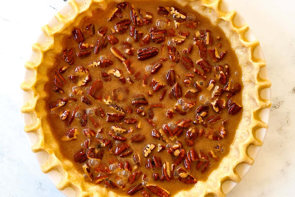 showing how to make pecan pie by adding pecans to pie followed by filling in an unbaked pie crust