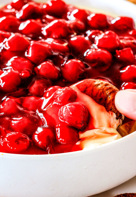 Easy, creamy NO BAKE Cherry Cheesecake Dip is one of the easiest AND most delicious desserts/appetizers that comes together in minutes! The perfect make ahead, stress free, crowd pleaser for all your holiday parties!
