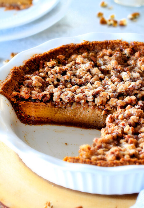 I will never go back to just Pumpkin Pie again!  This Pumpkin PRALINE Pie is a Thanksgiving and Christmas must!  Creamy pumpkin pie topped with crunchy, chewy brown sugar pecans for the perfect flavor and texture combination in every bite!  