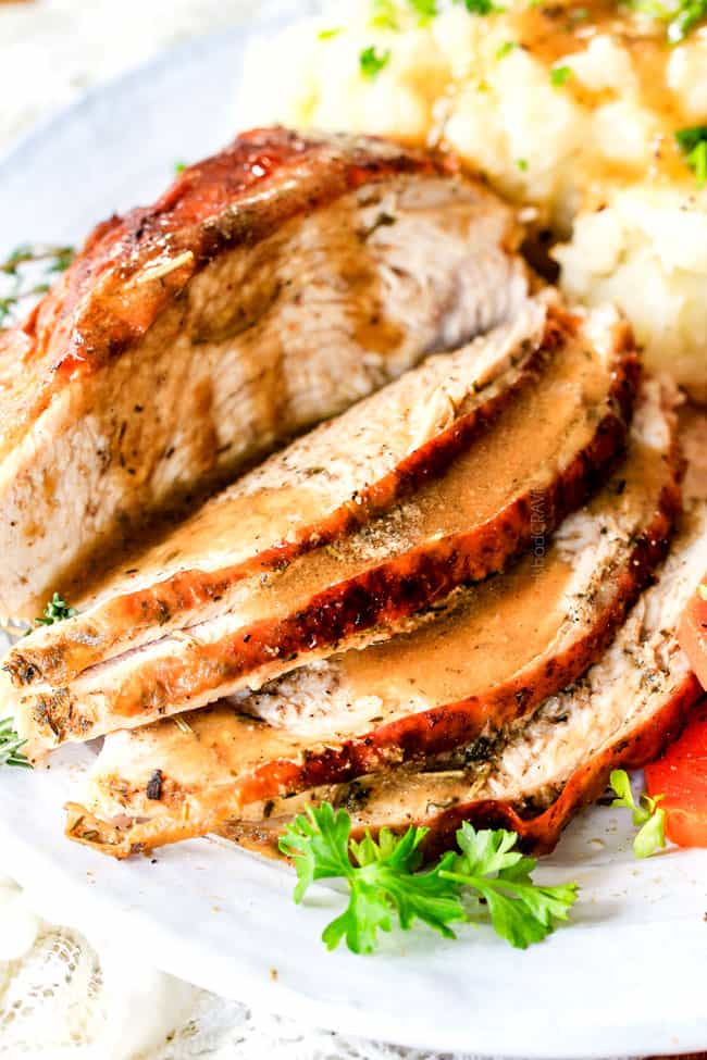 Thick cut slices of Roast Turkey with Herb Butter.