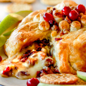 Rich and creamy Baked Brie in Puff Pastry is always a total luxuriously tasting crowd pleaser with minimal effort!  (step by step pictures included)  It can be prepped in advance then baked when you're ready for company! 