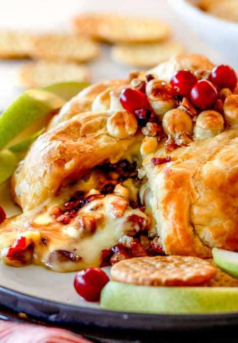 Rich and creamy Baked Brie in Puff Pastry is always a total luxuriously tasting crowd pleaser with minimal effort!  (step by step pictures included)  It can be prepped in advance then baked when you're ready for company! 