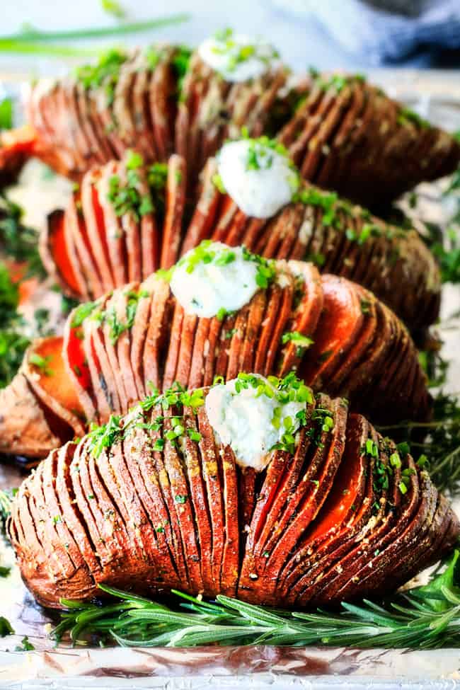These Hasselback Sweet Potatoes are tender, melt-in-your-mouth and bursting with garlic herb, butter flavor!  They look wonderfully gourmet for holidays and special occasions but are everyday easy! 