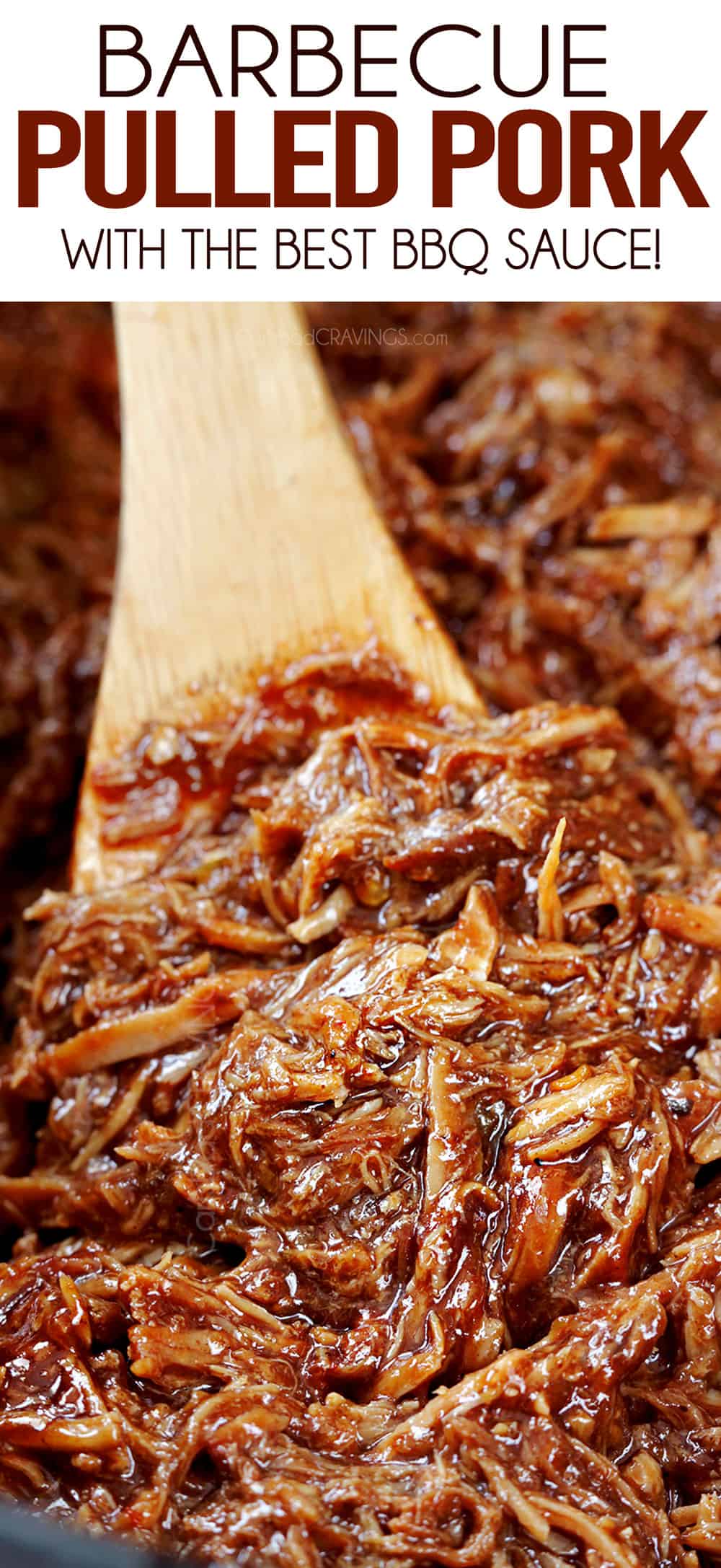 up close of BBQ Pulled Pork in the slow cooker showing how juicy and tender it is