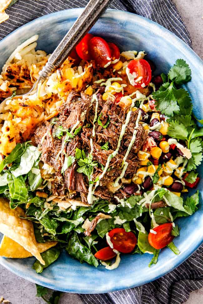showing what to make with beef barbacoa by making taco bowls