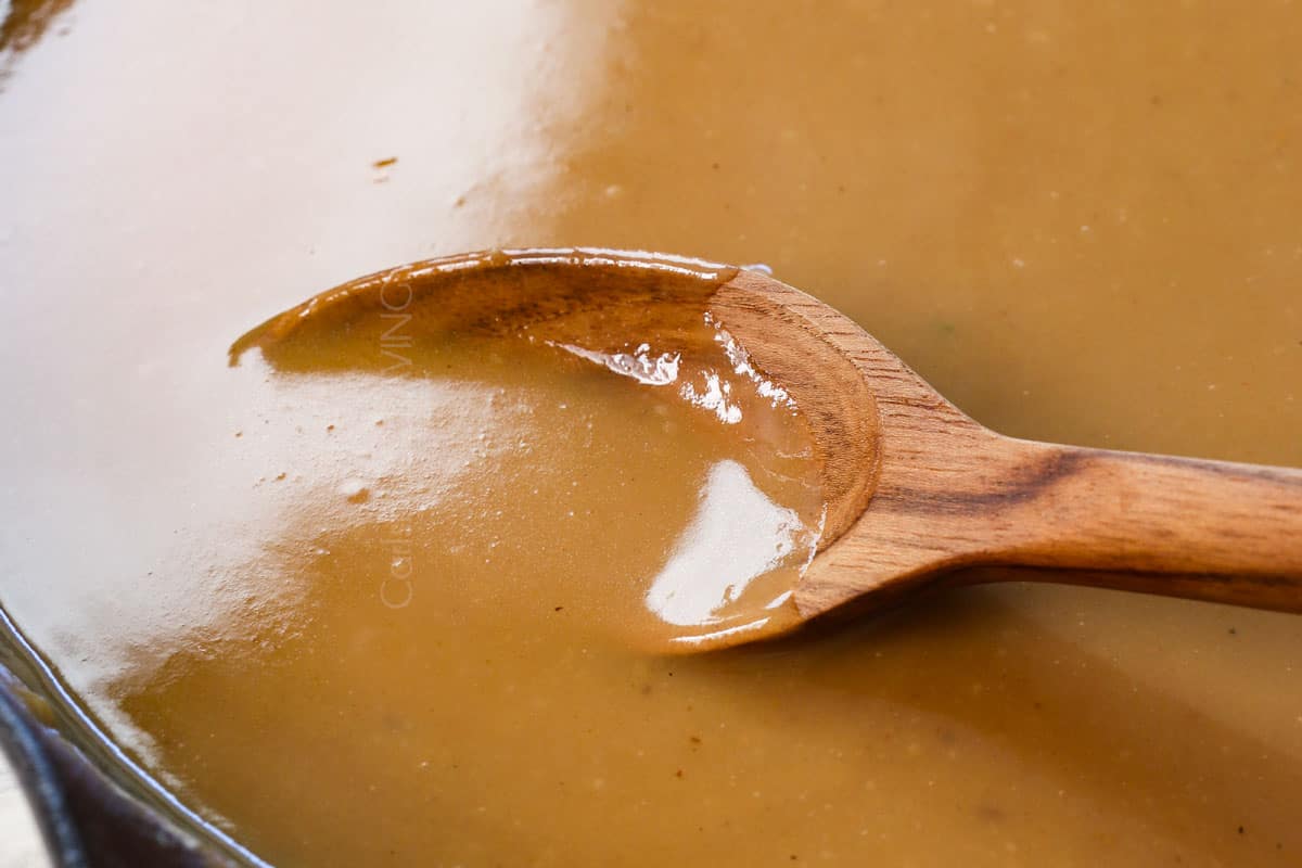 showing the consistency of the gravy for oven pot roast made from the drippings