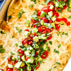 These are the BEST Green Chile Chicken Enchiladas I have ever had!!!  They are easy to make, satisfyingly rich, cheesy, creamy and saucy - no dry chicken enchiladas here! And the homemade green chile sour cream white sauce is out of this world!