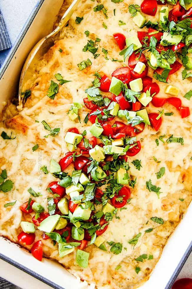 These are the BEST Green Chile Chicken Enchiladas I have ever had!!!  They are easy to make, satisfyingly rich, cheesy, creamy and saucy - no dry chicken enchiladas here! And the homemade green chile sour cream white sauce is out of this world!