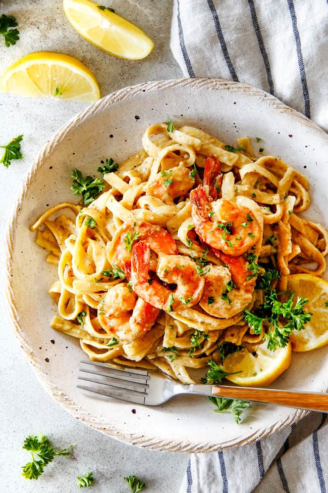 20 MINUTE Lemon Garlic Shrimp Fettuccine is wonderfully creamy, bursting with flavor and so easy!  The most gourmet tasting  dinner you can make in under 30 minutes!