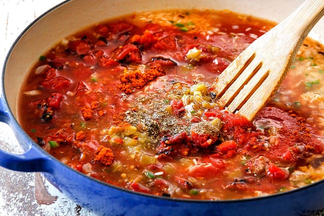 showing how to make Mexican rice by simmering on the stove until liquid is absorbed