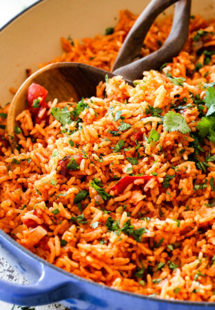authentic Mexican rice with fire roasted tomatoes in a blue skillet