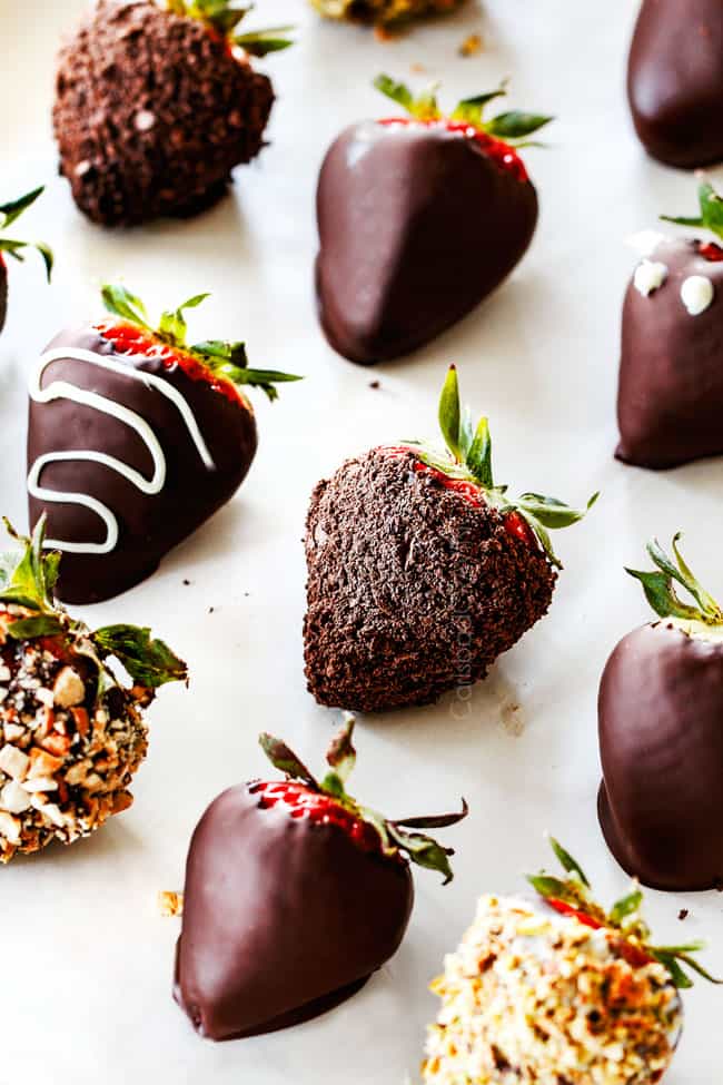 Chocolate dipped strawberries lined in rows