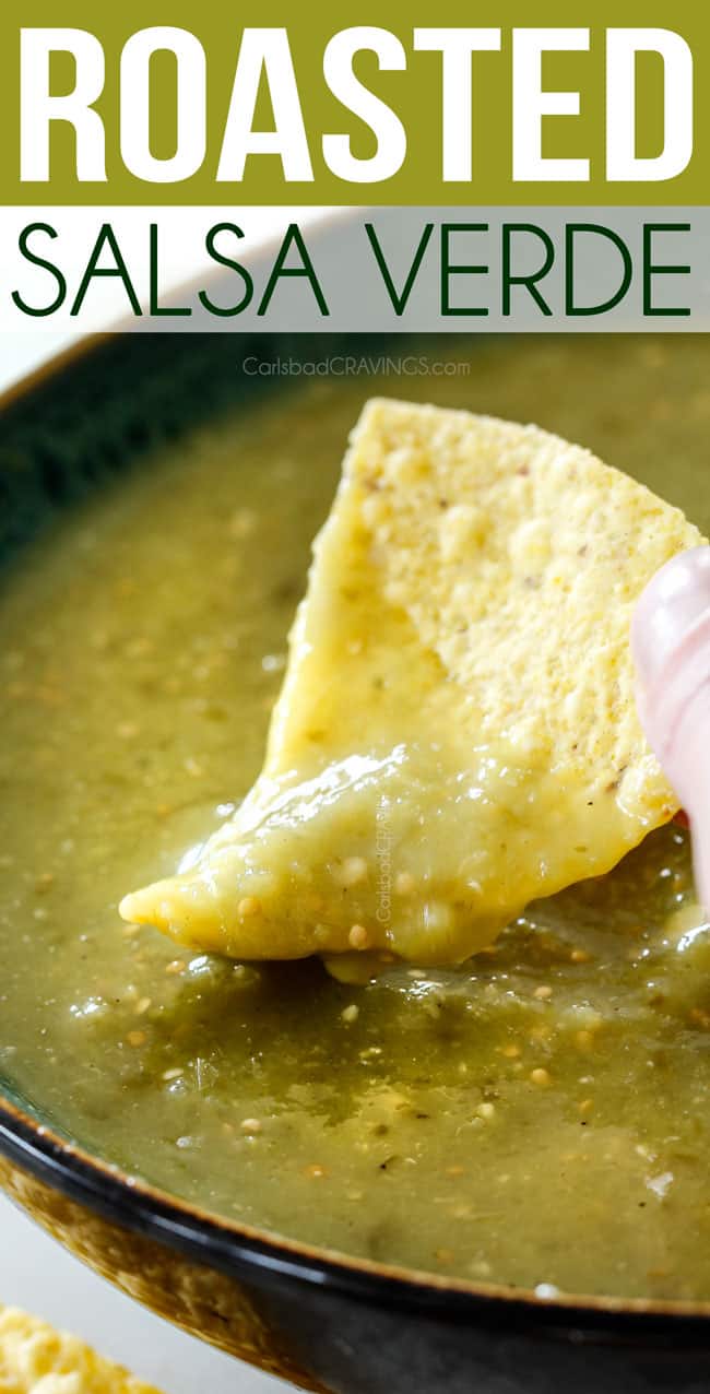 dipping tortilla chip into a bowl of best salsa verde