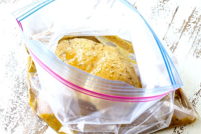 showing how to make Cobb Salad by marinating chicken in a plastic bag