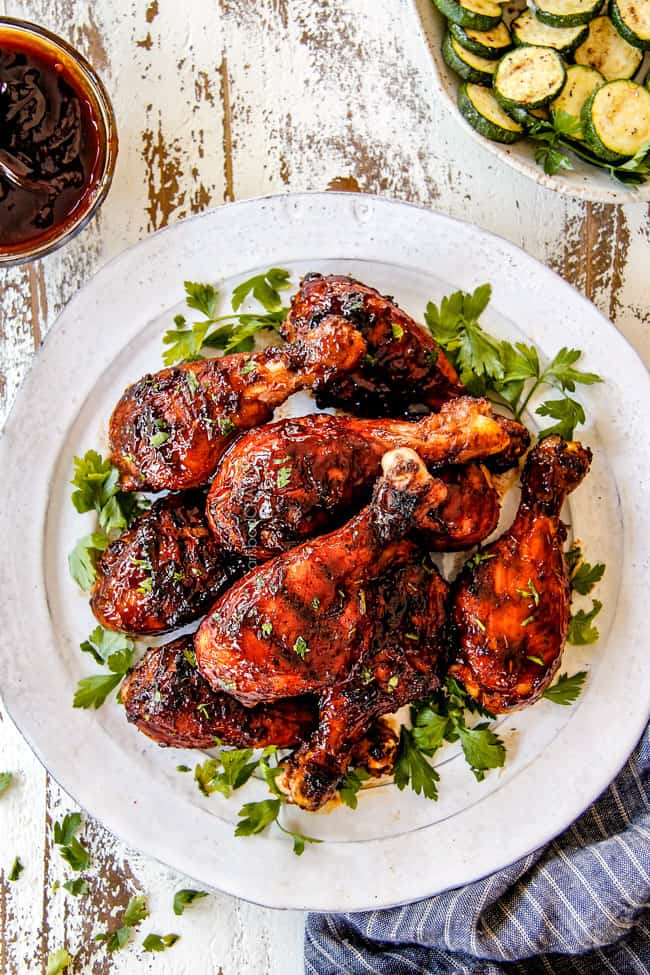 far away top view of the best grilled BBQ chicken on a white plate