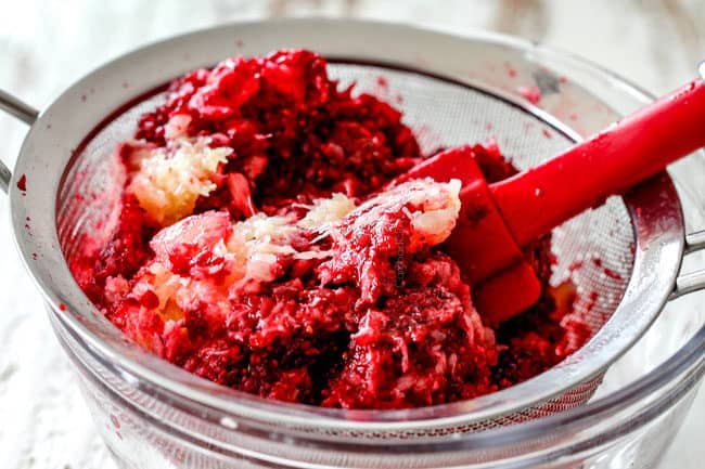 showing how to make ambrosia salad by stirring pineapple and cranberries together
