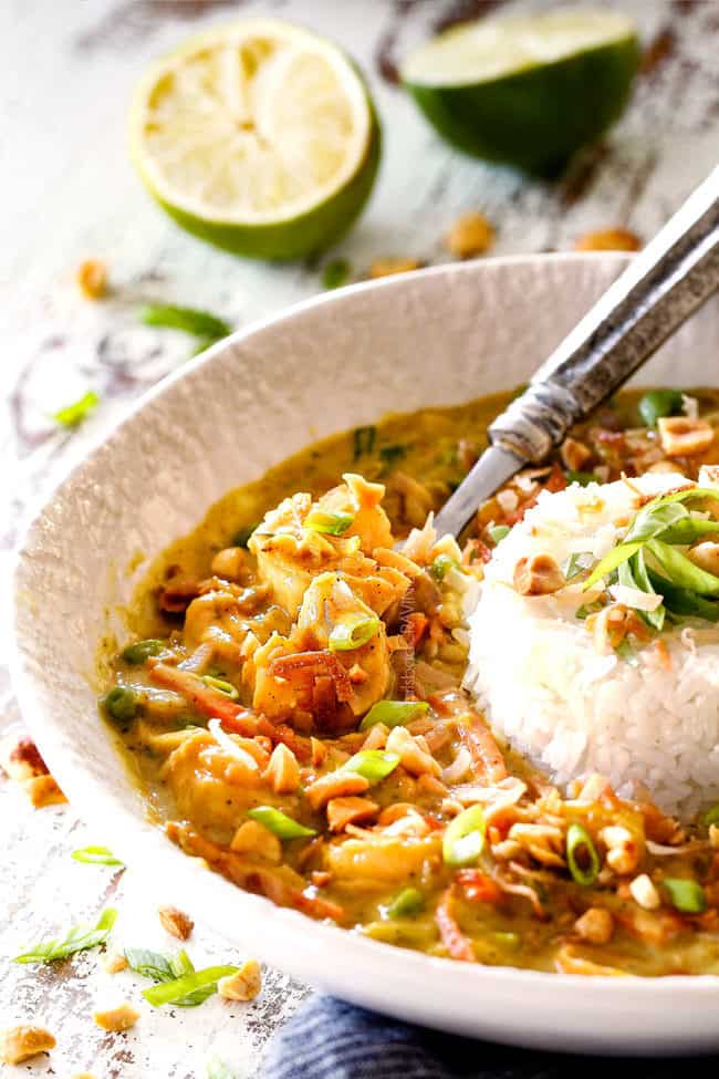 side view of Bang Bang Shrimp with rice and coconut in a white bowl