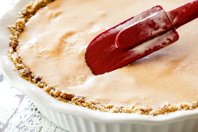 showing how to make ice cream pie by smoothing filling into pie crust