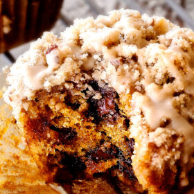 up close of the best pumpkin muffin with a bite out of it