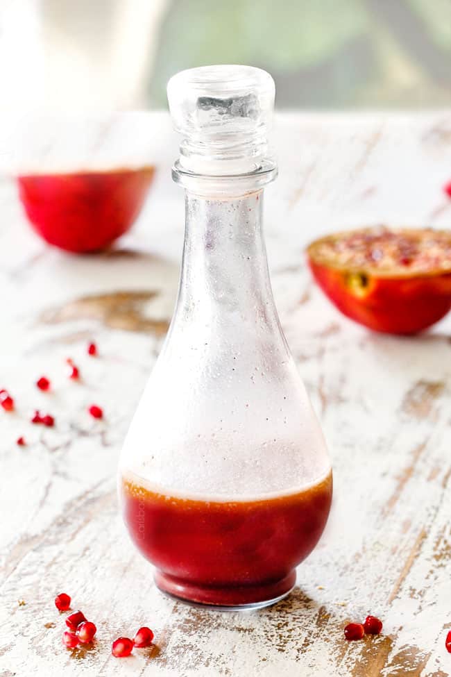 showing how to make pomegranate dressing for fall salad