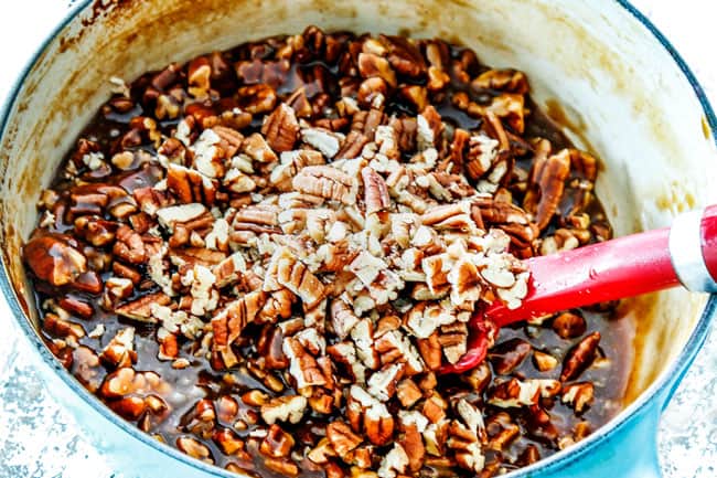 showing how to make pecan topping for Pecan Pie Cheesecake by adding pecans to caramel sauce