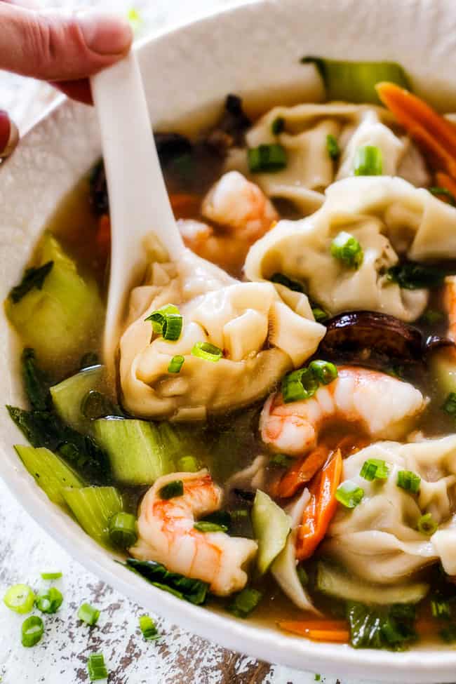 up close of authentic wonton soup recipe in a white bowl 
