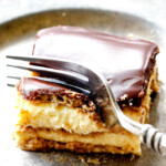 top view of a forking taking a bite of Chocolate Eclair Cake