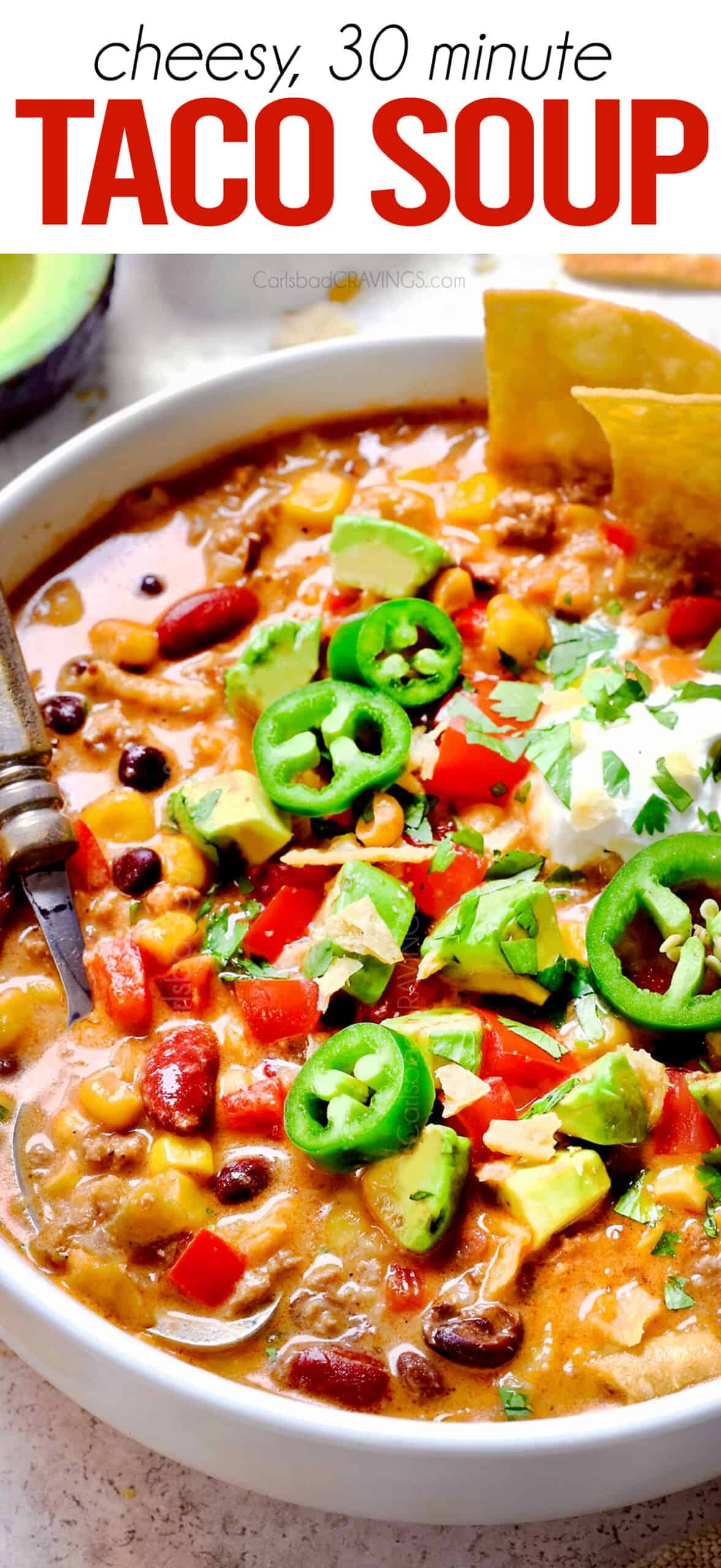 up close of a a bowl of easy taco soup piled with toppings