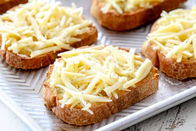 showing how to make French Onion Soup by adding cheese to a slice of bread