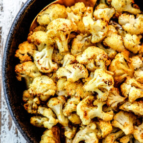 top view of spicy roasted cauliflower in a bowl