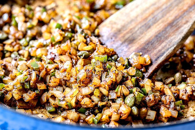 showing how to make Arroz con Pollo by with an up close view of cooking sofrito 