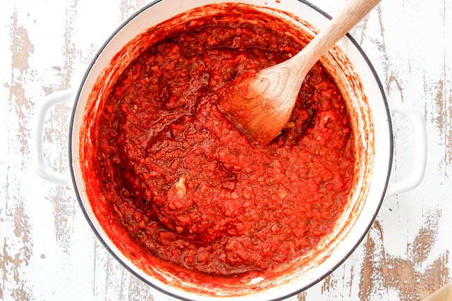 showing how to make marinara sauce by simmering sauce