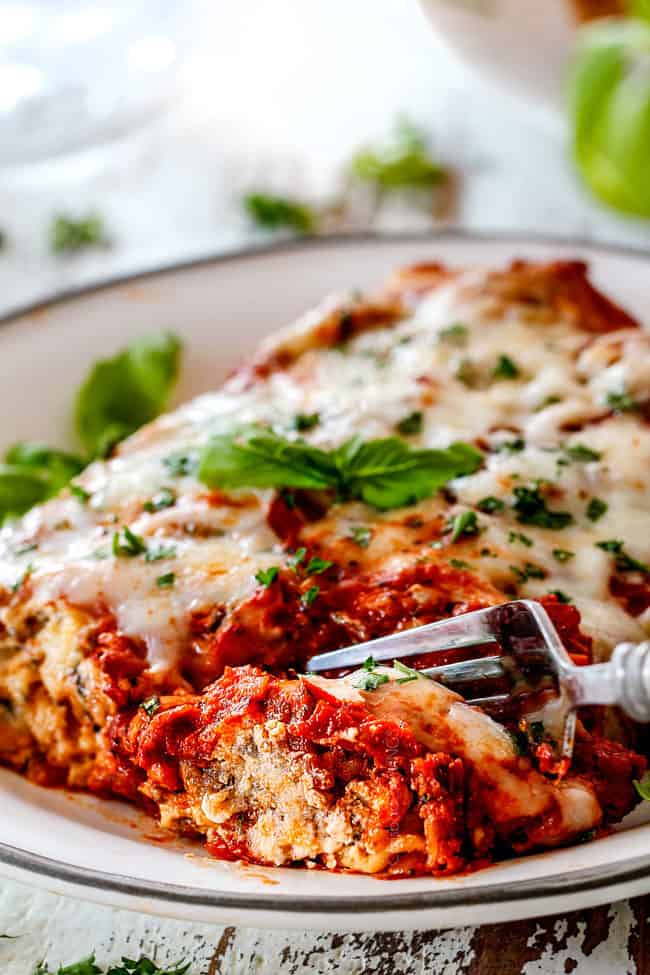 a fork taking a bite out of easy manicotti
