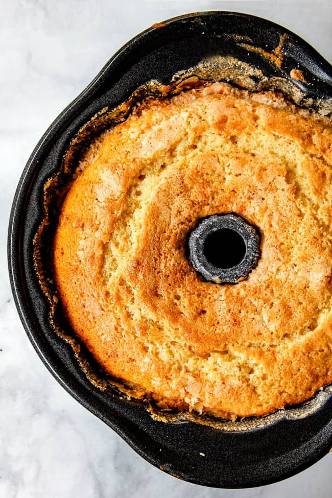 showing how to make Kentucky Butter Cake by taking cake out of the oven
