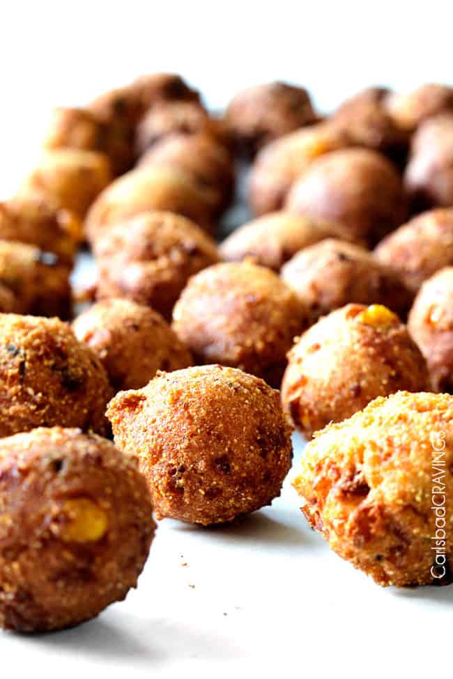 easy hush puppies with cornmeal lined up after frying