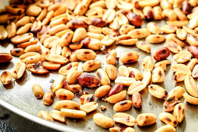 showing how to make spicy ramen by cooking peanuts