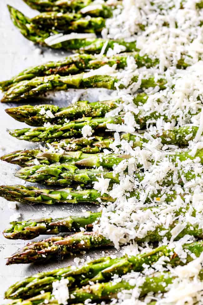 showing how to cook asparagus with freshly grated Parmesan
