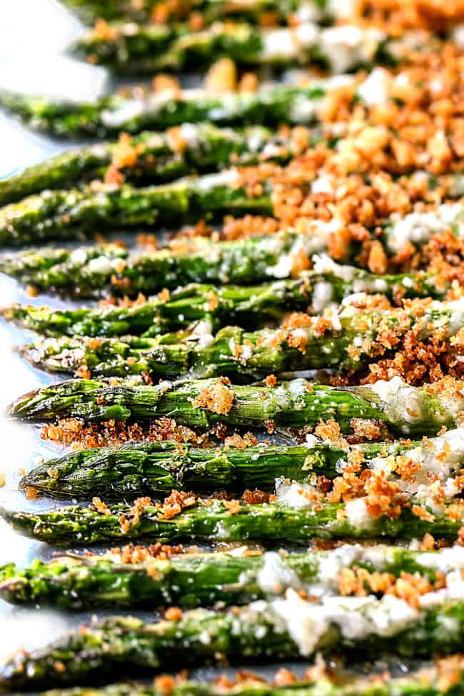showing how to make baked asparagus by adding panko 
