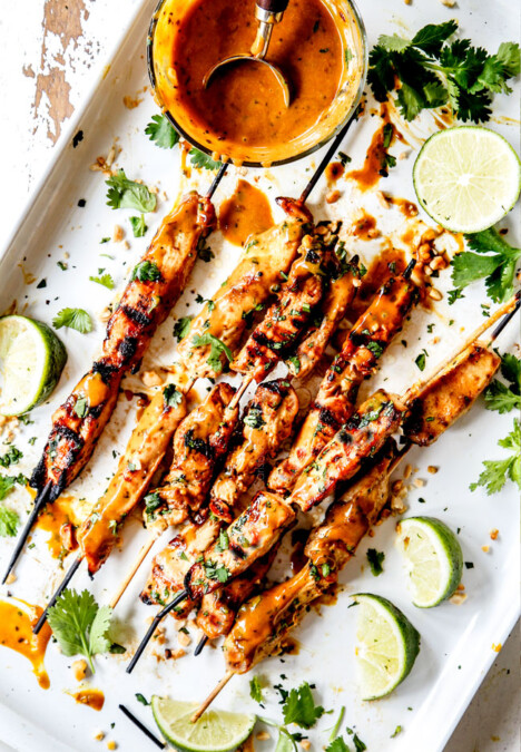 top view of grilled chicken satay with Thai peanut sauce