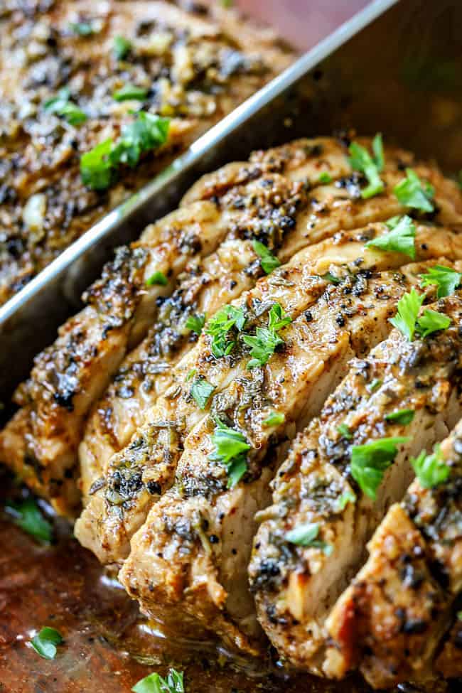 showing how to cook pork tenderloin by slicing it against the grain