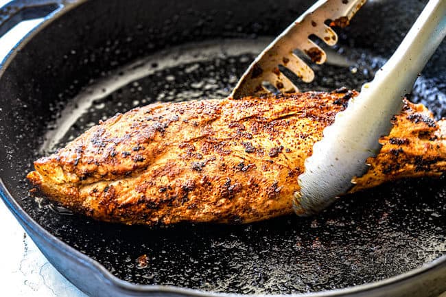 showing how to cook pork tenderloin by searing it in a skillet